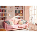 Pink reading room canvas art with sofa and bookshelves for cozy bedroom or office decor.