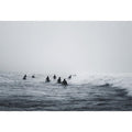 Moody surf canvas art with surfers and misty ocean waves for modern office decor.