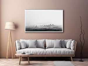 Surfers waiting on ocean waves artwork for coastal living room decor