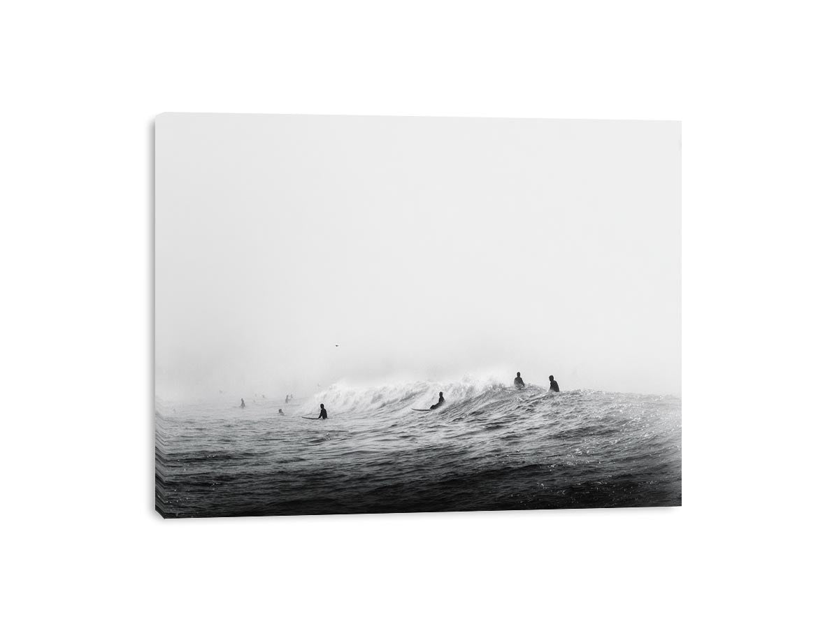 Surfers waiting on ocean waves artwork for coastal living room decor
