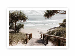 Boardwalk leading to beach artwork for coastal living room decor