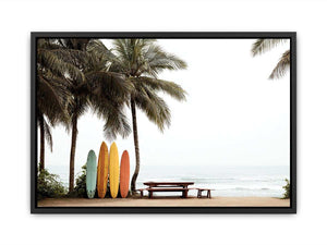 Colorful surfboards and palm trees overlooking the ocean for coastal wall decor