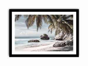 Palm-lined tropical beach with coastal rocks for luxury seaside decor