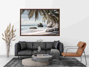 Palm-lined tropical beach with coastal rocks for luxury seaside decor
