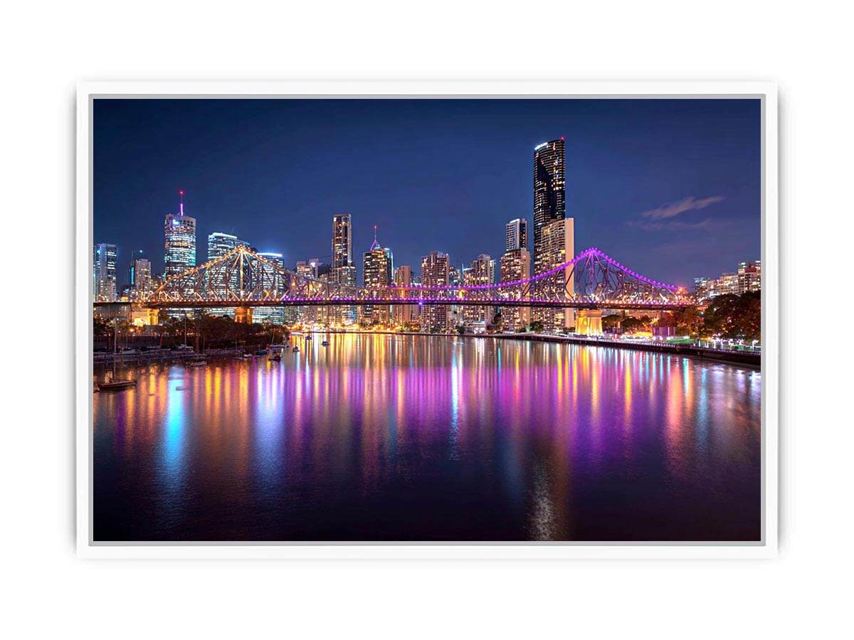 Illuminated bridge and city skyline canvas art for contemporary living room decor.