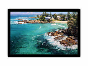 Turquoise coastal cove canvas art with rocky shoreline for modern living room decor.