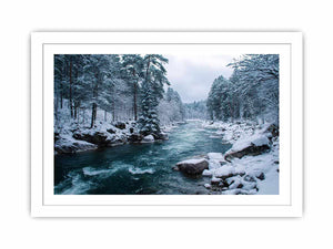Snowy forest river photography print for calm modern office wall decor.