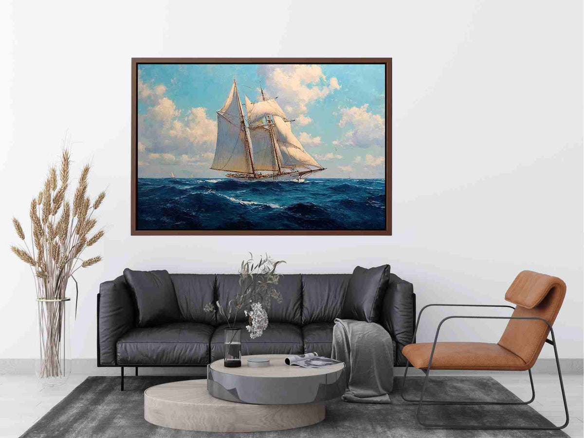 Classic sailboat canvas art with blue ocean and white sails for nautical living room decor.