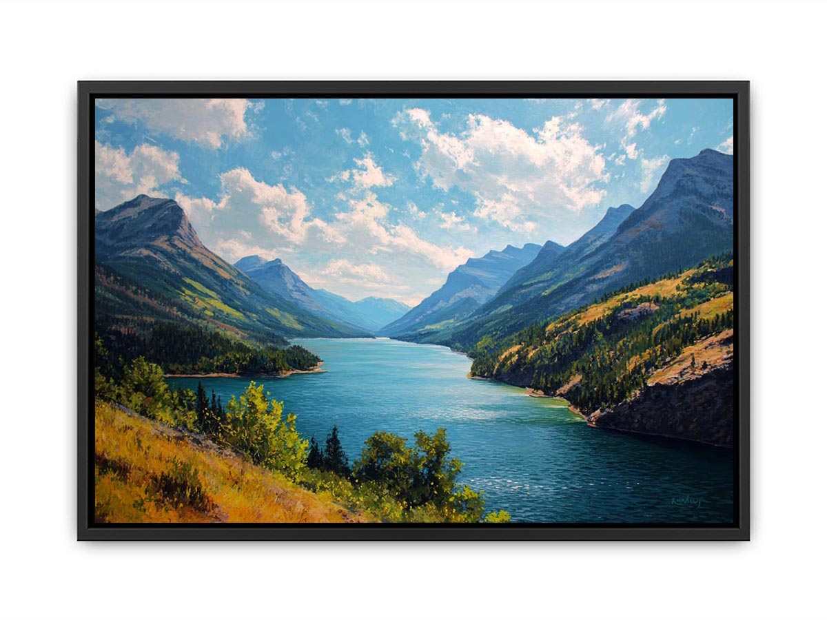 Mountain lake canvas art with blue water and green valley for living room decor.