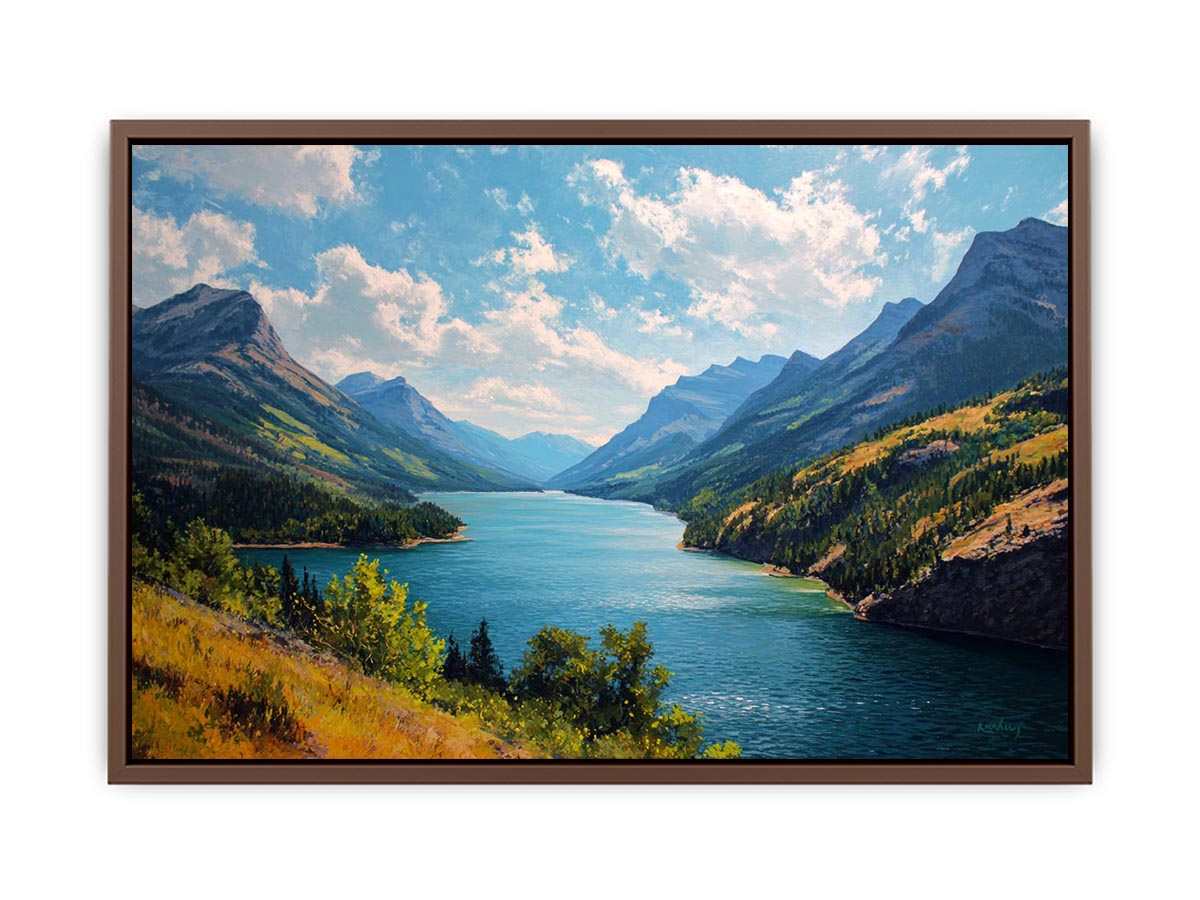 Mountain lake canvas art with blue water and green valley for living room decor.