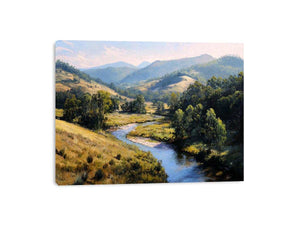 Sunlit river valley landscape canvas art for calm modern rustic living room decor.