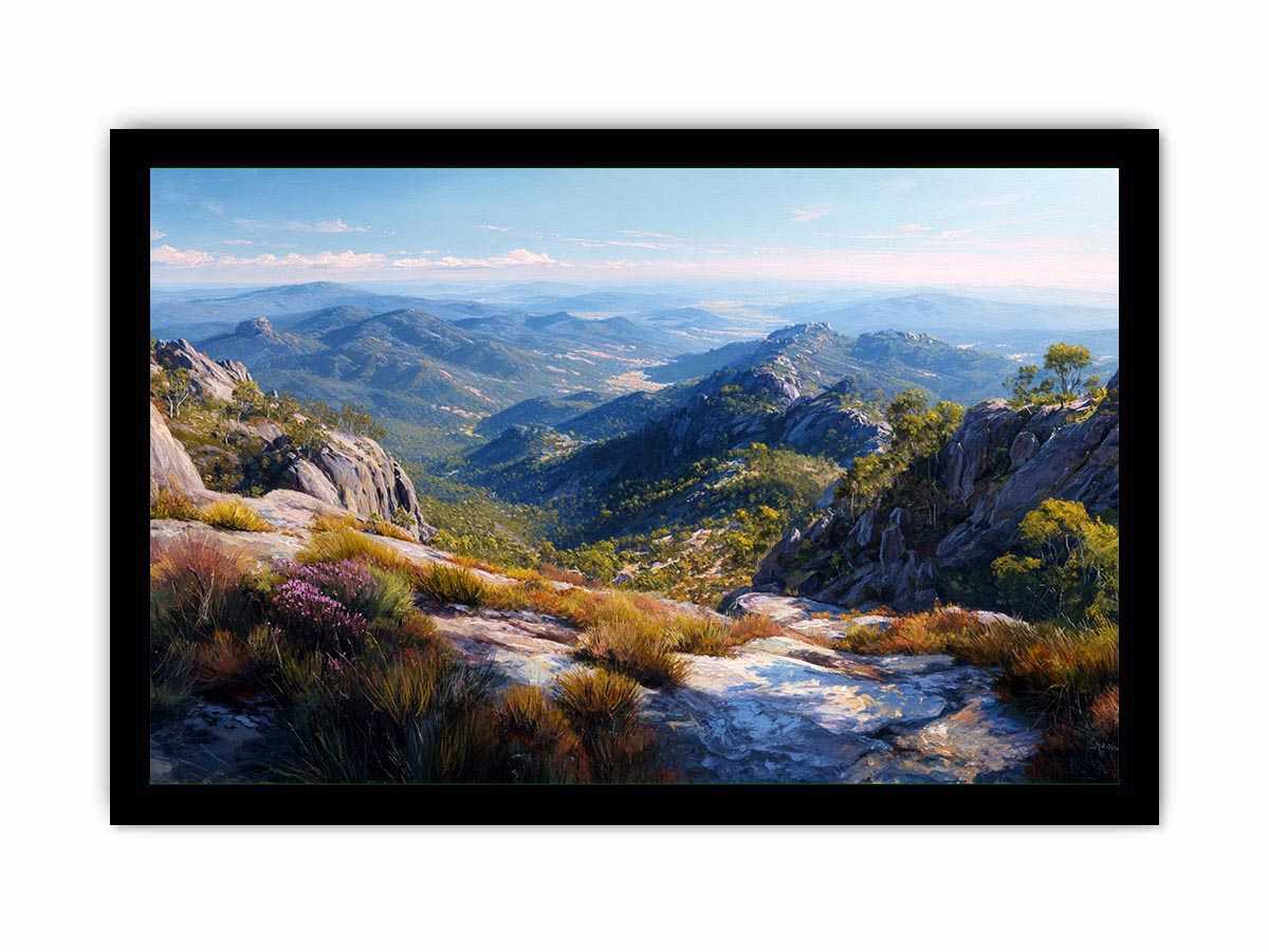 Expansive mountain valley landscape canvas art for wide modern living room wall.