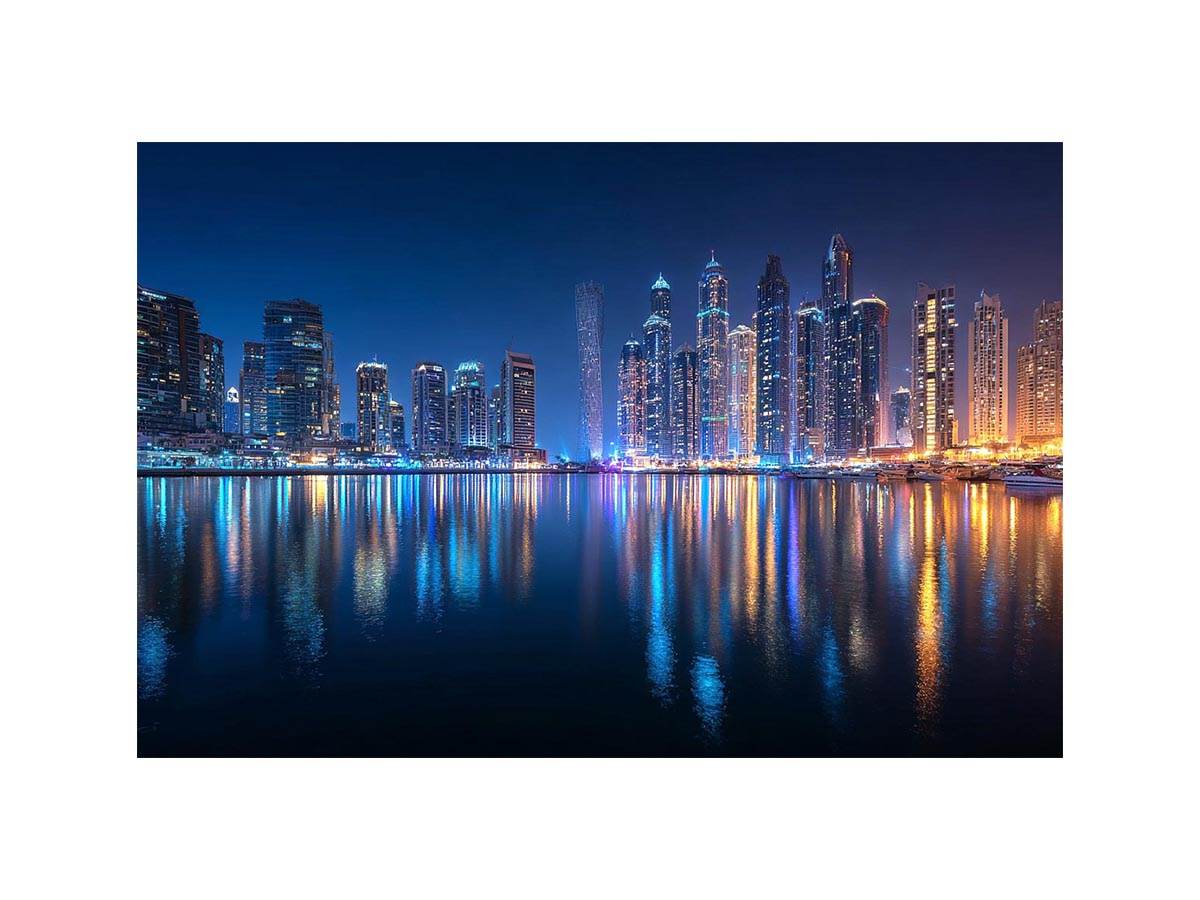 Luxury night city skyline canvas art with marina reflections for modern living room decor.