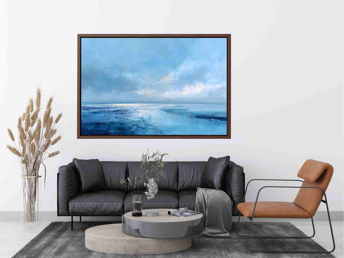 Soft blue abstract seascape canvas art for calm coastal bedroom or living room decor.
