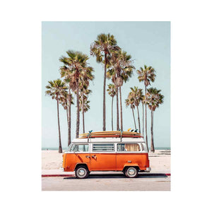 Vintage surf van with palm trees and beach atmosphere for coastal living room decor.