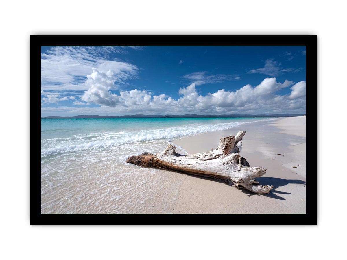 Peaceful beach and driftwood canvas art for coastal bedroom decor.