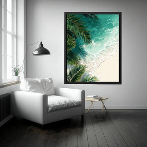 Coastal beach artwork with turquoise ocean waves and palm leaves for relaxing coastal living room decor