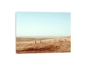 Prairie landscape photography with golden grass and fence for modern farmhouse decor