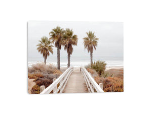 Coastal boardwalk and palm tree canvas art for serene beach house decor