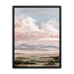 Soft desert landscape canvas art with blush clouds and mountains for calm bedroom decor.