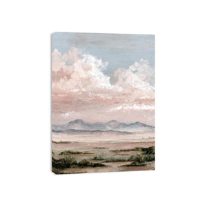 Soft desert landscape canvas art with blush clouds and mountains for calm bedroom decor.