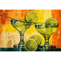 Colorful lime cocktails in martini glasses with citrus slices on vibrant abstract background