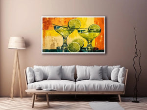 Colorful lime cocktails in martini glasses with citrus slices on vibrant abstract background