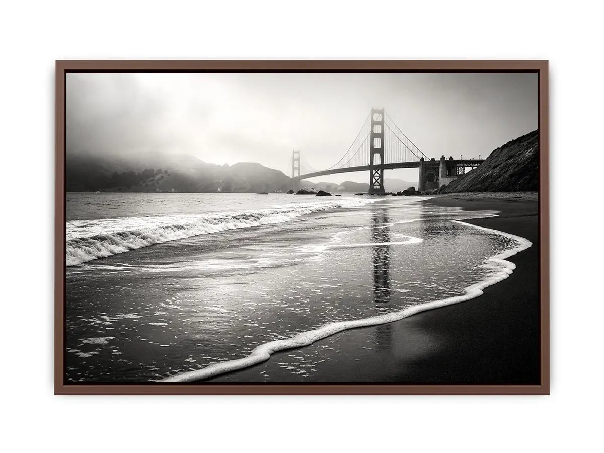 Minimal black and white coastal bridge wall art with misty beach waves and cinematic ocean landscape photography