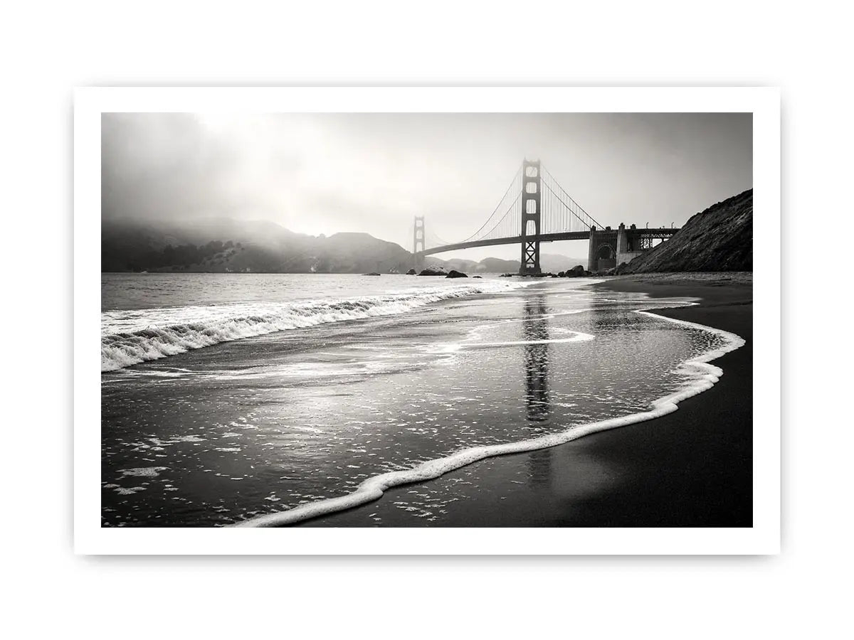 Minimal black and white coastal bridge wall art with misty beach waves and cinematic ocean landscape photography