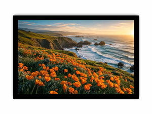Scenic coastal wildflower wall art with orange blooms, ocean cliffs, and peaceful panoramic seaside landscape