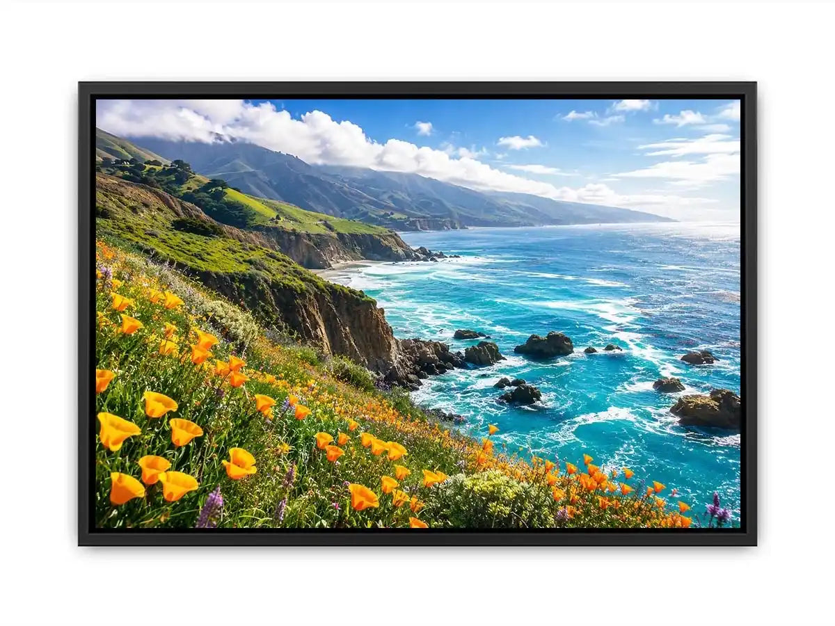 Bright coastal cliff landscape wall art featuring turquoise ocean waves, dramatic rocky coastline, and vibrant wildflowers under soft natural daylight.