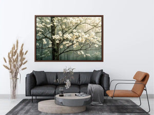 Soft magnolia blossom wall art featuring delicate white flowers on misty woodland branches with calming neutral tones and elegant botanical styling.