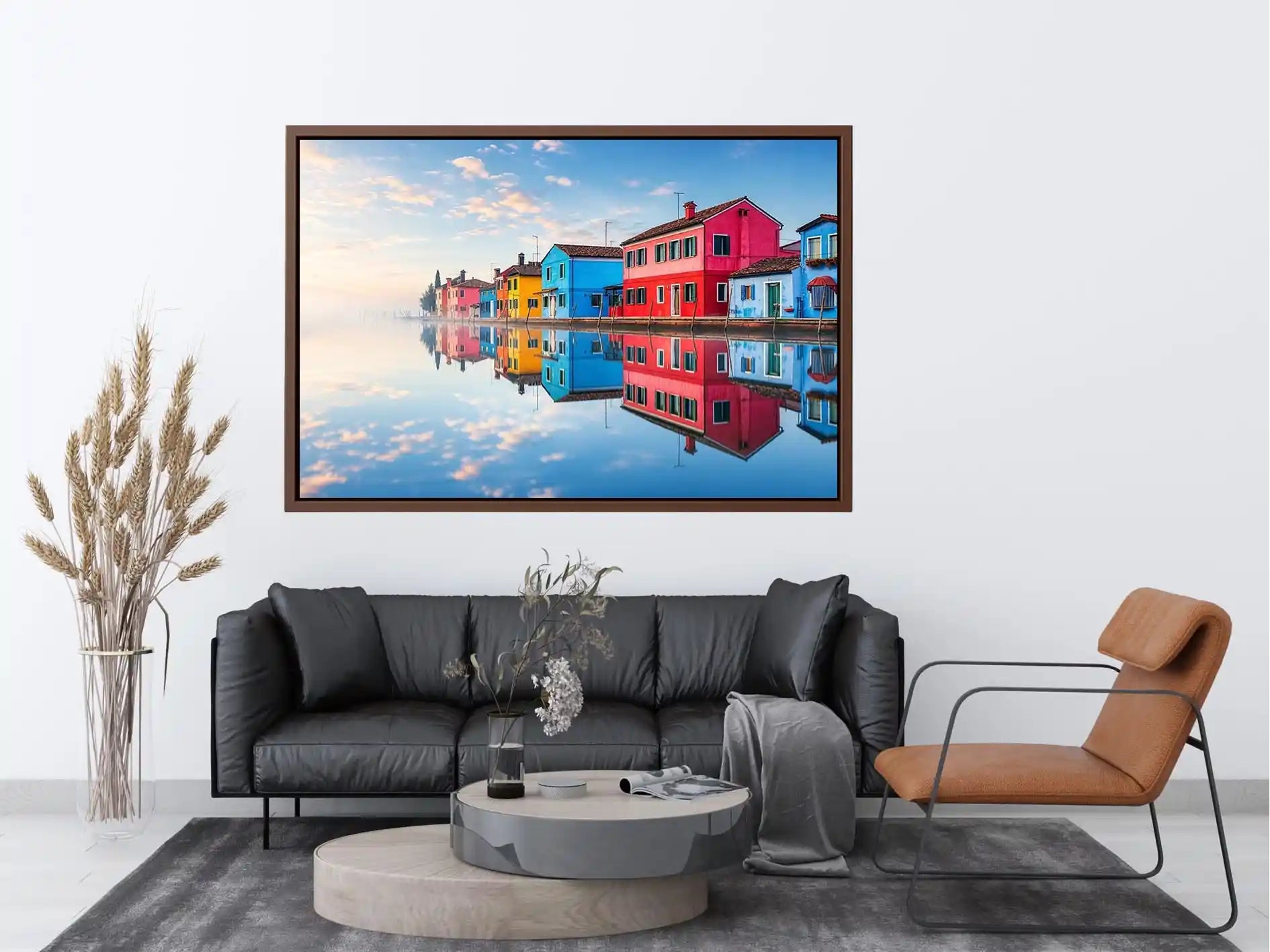 Bright colorful coastal village wall art featuring vibrant European houses reflected in calm water with soft fog and minimalist atmospheric tones.