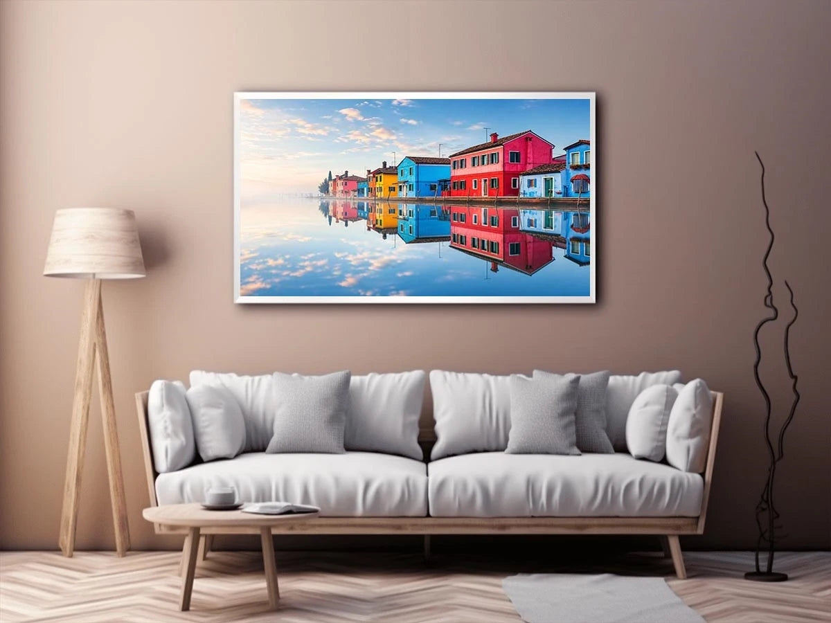Bright colorful coastal village wall art featuring vibrant European houses reflected in calm water with soft fog and minimalist atmospheric tones.