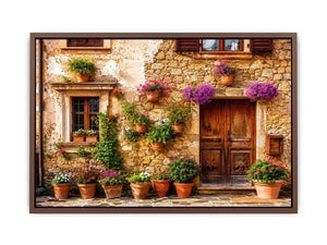 Rustic Mediterranean stone house facade with pink flowers and vintage wooden doors wall art canvas for luxury living room decor