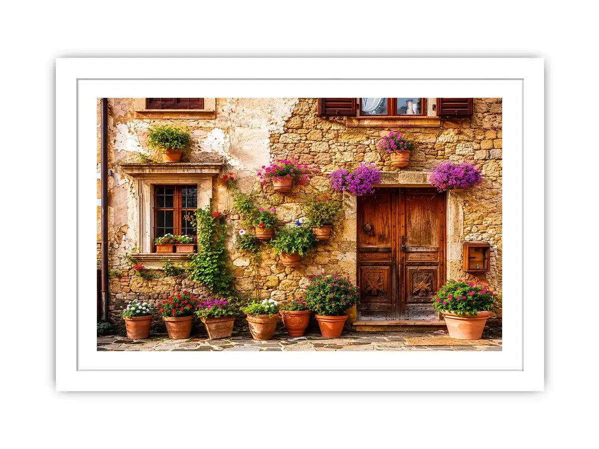 Rustic Mediterranean stone house facade with pink flowers and vintage wooden doors wall art canvas for luxury living room decor