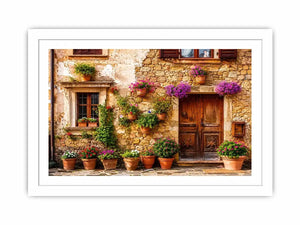 Rustic Mediterranean stone house facade with pink flowers and vintage wooden doors wall art canvas for luxury living room decor