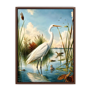 Vintage white heron standing in tranquil marshland with soft blue sky and reeds coastal bird wall art canvas