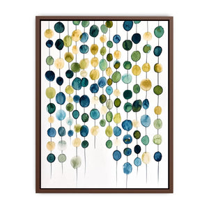 Minimalist watercolor circles in blue and beige arranged in vertical hanging pattern