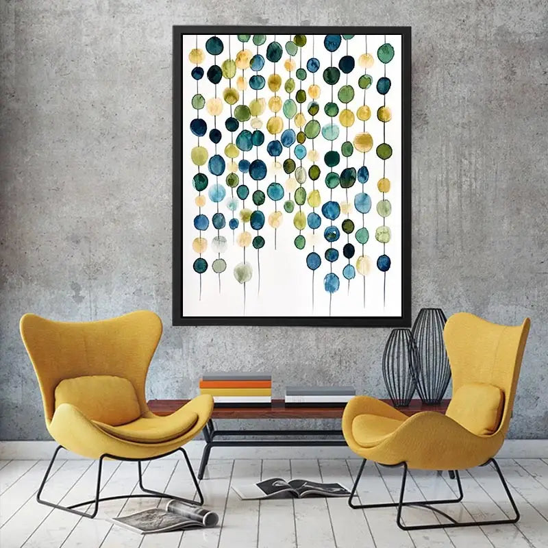 Minimalist watercolor circles in blue and beige arranged in vertical hanging pattern
