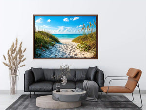 Coastal beach path wall art with sandy dunes leading to blue ocean under clear sky, serene seaside canvas for living room and beach house decor
