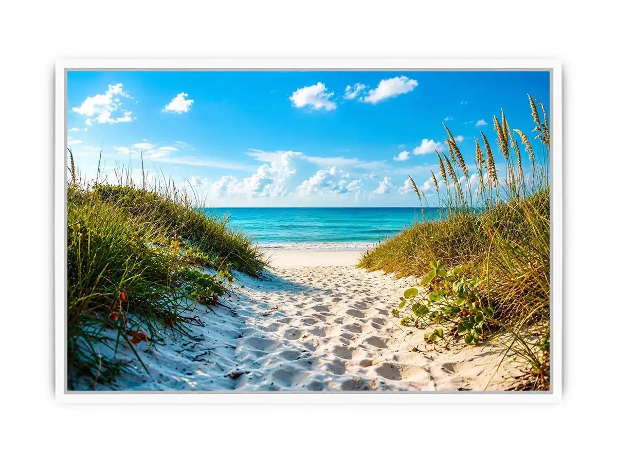 Coastal beach path wall art with sandy dunes leading to blue ocean under clear sky, serene seaside canvas for living room and beach house decor