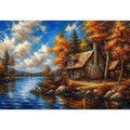 Autumn lake cabin painting with colorful trees and peaceful water reflection
