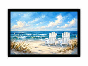 White beach chairs overlooking calm ocean waves on a sandy coastal shoreline