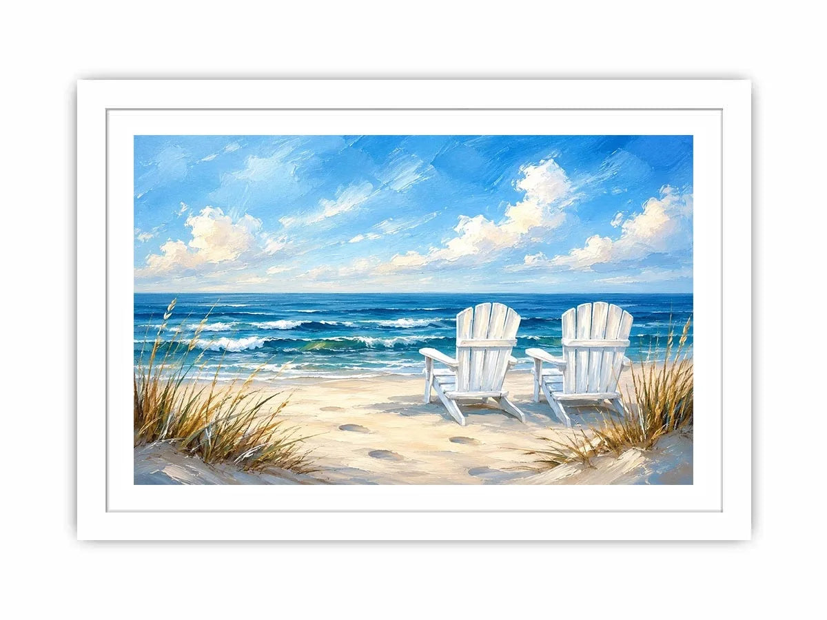 White beach chairs overlooking calm ocean waves on a sandy coastal shoreline