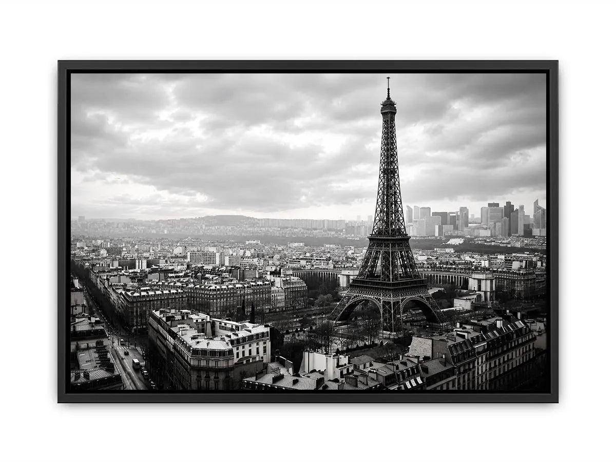 Black and white panoramic view of the Eiffel Tower overlooking the Paris cityscape