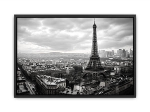 Black and white panoramic view of the Eiffel Tower overlooking the Paris cityscape