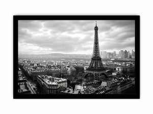 Black and white panoramic view of the Eiffel Tower overlooking the Paris cityscape