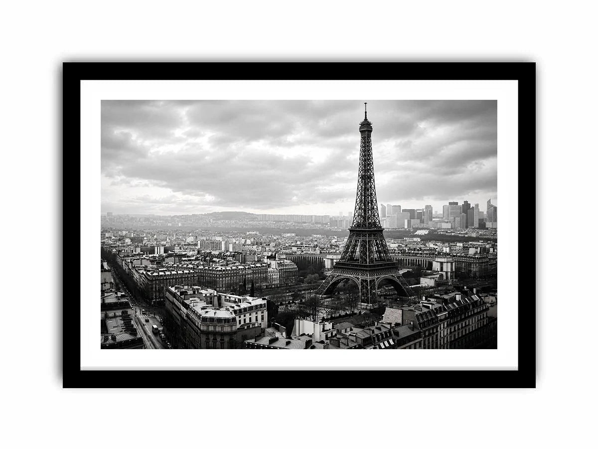 Black and white panoramic view of the Eiffel Tower overlooking the Paris cityscape