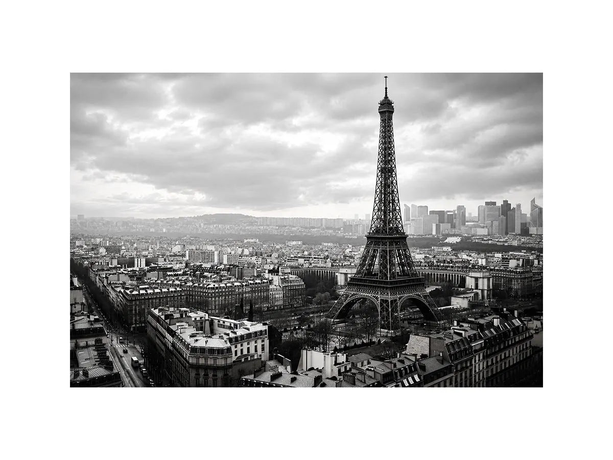 Black and white panoramic view of the Eiffel Tower overlooking the Paris cityscape